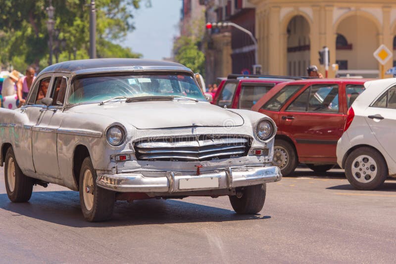 CUBA, HAVANA - MAY 5, 2017: American gray retro car on city street. Ð¡opy space for text.